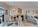 Cozy dining area featuring a round table, elegant lighting, and decorative accents, creating a warm atmosphere at 7890 Ashford Dr, Lakeland, FL 33810