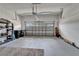Clean and organized two-car garage featuring an automatic door and plenty of open space at 7890 Ashford Dr, Lakeland, FL 33810