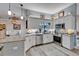 Well-lit kitchen featuring granite countertops and stainless steel appliances at 7890 Ashford Dr, Lakeland, FL 33810