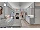 Spacious kitchen with granite countertops, stainless steel appliances, and ample cabinet space at 7890 Ashford Dr, Lakeland, FL 33810
