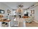 Bright living room with a decorative fireplace and comfortable seating, perfect for relaxing at 7890 Ashford Dr, Lakeland, FL 33810