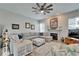 Comfortable living room with plush seating, decorative fireplace, and a cozy atmosphere at 7890 Ashford Dr, Lakeland, FL 33810