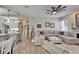 Open-concept living room featuring stylish decor, lots of natural light, and seamless flow at 7890 Ashford Dr, Lakeland, FL 33810