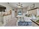 Bright main bedroom with a large bed and a beautiful view of the outdoor pool at 7890 Ashford Dr, Lakeland, FL 33810