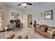 Well-lit office space with a comfortable chair and a view into a bedroom, ideal for working from home at 7890 Ashford Dr, Lakeland, FL 33810