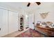 Cozy bedroom features a ceiling fan, closet, and an ornate rug, creating a charming and inviting atmosphere at 807 Osceola St, Lakeland, FL 33801