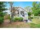 Charming home with a welcoming front porch, and beautifully landscaped yard at 807 Osceola St, Lakeland, FL 33801