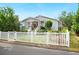 Charming home with a welcoming front porch and meticulously landscaped yard at 807 Osceola St, Lakeland, FL 33801