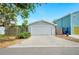 Garage exterior with a paved driveway, showcasing additional parking at 807 Osceola St, Lakeland, FL 33801