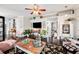 Open-concept living room with dark wood floors, neutral walls, and a cozy ambiance at 807 Osceola St, Lakeland, FL 33801