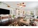 Inviting living room features dark wood floors, a cozy seating area, and natural light at 807 Osceola St, Lakeland, FL 33801