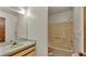 Simple bathroom with tub and shower combination with neutral walls at 819 Swann Dr, Lakeland, FL 33809