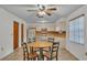 Large kitchen with wood-look countertops, tile flooring, and space for a table at 819 Swann Dr, Lakeland, FL 33809