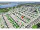Aerial view of the neighborhood showcasing community layout and proximity to the lake at 860 Killarney Ln, Auburndale, FL 33823