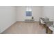 Versatile room featuring neutral walls, large window, and desk setup, offering a functional living space at 860 Killarney Ln, Auburndale, FL 33823