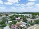 Stunning aerial view of home near a lake with mature trees and lush landscaping at 901 Spicewood Dr, Lakeland, FL 33801