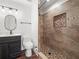 Bathroom features a modern vanity and tiled walk-in shower at 901 Spicewood Dr, Lakeland, FL 33801
