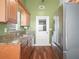 Functional kitchen space with stainless steel appliances and granite countertops at 901 Spicewood Dr, Lakeland, FL 33801