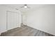 Spacious room with wood-look flooring and large closet at 950 W 2Nd St, Lakeland, FL 33805
