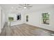 Bright living room with a view into the kitchen and lots of natural light at 950 W 2Nd St, Lakeland, FL 33805