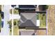 Overhead view highlighting the home's roof, landscaping, and proximity to neighboring properties at 983 Revere Ave, Haines City, FL 33844