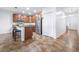 Well-equipped kitchen features stainless steel appliances, granite countertops, and a convenient island at 983 Revere Ave, Haines City, FL 33844