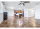 Spacious living room and adjacent kitchen with modern appliances and ample countertop space at 983 Revere Ave, Haines City, FL 33844