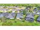 Aerial view of homes showcasing well-manicured lawns and mature landscaping at 1036 Stoney Creek Dr, Lakeland, FL 33811