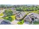 Aerial view showcasing houses with well-maintained yards and neighborhood streets at 1036 Stoney Creek Dr, Lakeland, FL 33811