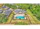 Aerial view of home with private pool, patio and landscaped backyard at 1036 Stoney Creek Dr, Lakeland, FL 33811