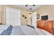 Comfortable bedroom with closet space, soft decor, and a bed for relaxing evenings at 1036 Stoney Creek Dr, Lakeland, FL 33811
