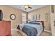 Cozy bedroom with a comfortable bed, neutral colors, and soft lighting, creating a relaxing space at 1036 Stoney Creek Dr, Lakeland, FL 33811