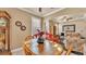 Inviting dining area adjacent to the living space, with a traditional grandfather clock at 1036 Stoney Creek Dr, Lakeland, FL 33811