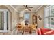 Bright dining area with traditional furnishings, and natural light from a window with plantation shutters at 1036 Stoney Creek Dr, Lakeland, FL 33811