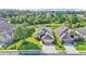 Charming single-story home boasts a well-manicured lawn, mature tree, and inviting curb appeal at 1036 Stoney Creek Dr, Lakeland, FL 33811