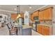 Modern kitchen featuring a breakfast bar, sleek appliances, and ample counter space for efficient meal prep at 1036 Stoney Creek Dr, Lakeland, FL 33811