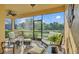 Cozy screened-in lanai with comfortable seating, ideal for enjoying the outdoors at 1036 Stoney Creek Dr, Lakeland, FL 33811