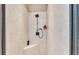 Modern bathroom with a luxurious walk-in shower featuring a sleek shower head and built-in seat at 1036 Stoney Creek Dr, Lakeland, FL 33811