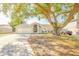 Beautiful single Gathering home with mature landscaping, long driveway, and plenty of curb appeal at 1061 Lowry Ave, Lakeland, FL 33801