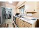 Functional kitchen with stainless steel appliances, tile floors, and plenty of storage, perfect for cooking at 1061 Lowry Ave, Lakeland, FL 33801