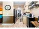 Functional kitchen with stainless steel appliances, tile floors, and plenty of storage, perfect for cooking at 1061 Lowry Ave, Lakeland, FL 33801