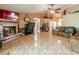 Spacious living room with tile flooring, fireplace, and plenty of natural light at 1061 Lowry Ave, Lakeland, FL 33801