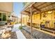 Outdoor kitchen area featuring custom woodwork, ideal for cooking and entertaining guests outdoors at 1061 Lowry Ave, Lakeland, FL 33801