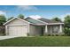 Charming single-story home with a well-manicured lawn, attached garage, and appealing architectural details at 1067 Aruba Ave, Mulberry, FL 33860