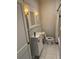 Modern bathroom with a sleek vanity, toilet, and a combined shower and tub with white subway tile at 1217 King Ave, Lakeland, FL 33803