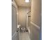 Compact bathroom featuring a combined shower and tub, a toilet, and a small vanity sink at 1217 King Ave, Lakeland, FL 33803