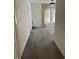 Well-lit bedroom features soft gray carpet, natural light, and neutral walls at 1217 King Ave, Lakeland, FL 33803