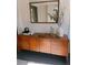 Elegant entryway showcasing a stylish console table, decorative mirror, and contemporary décor at 1217 King Ave, Lakeland, FL 33803