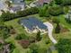 Aerial view of a large single Gathering home with screened pool at 130 Sylvana Ct, Auburndale, FL 33823