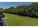 Beautifully maintained lawn with plenty of trees and privacy at 130 Sylvana Ct, Auburndale, FL 33823